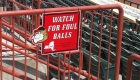 risk management sign for foul balls at baseball stadium