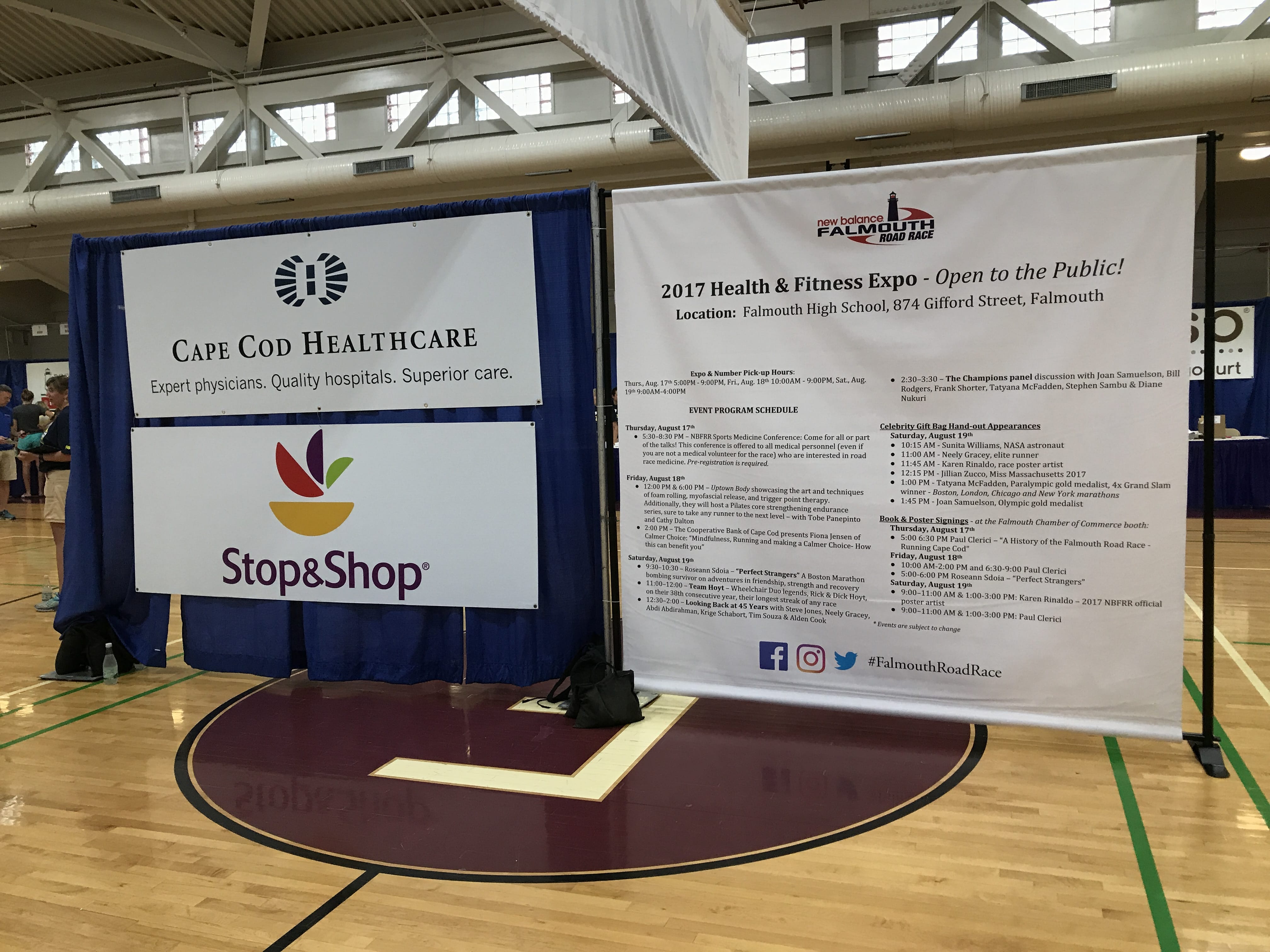 New Balance Falmouth Road Race Expo Sponsor Signage and Schedule Banner