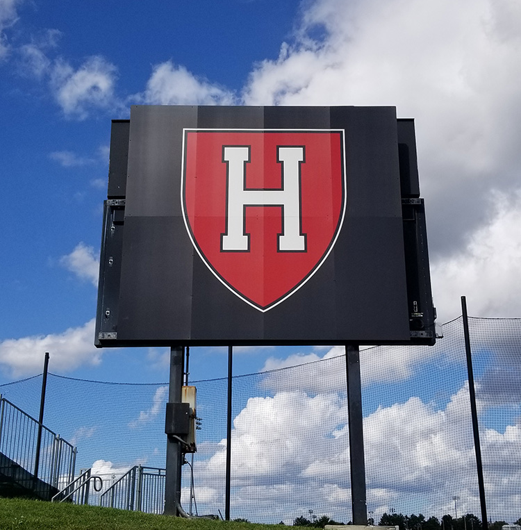 Harvard University scoreboard signage