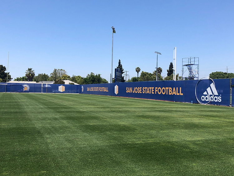 San Jose State University - Mesh Windscreens on Football Practice Field Sideline