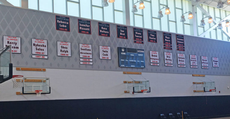 Cloth player recognition banners are UConn basketball practice facility