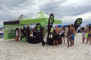 the campus agency branded tents and advertising flags